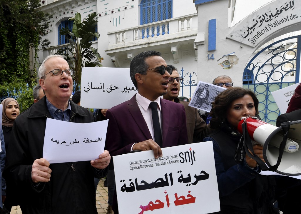 Des journalistes tunisiens participent à une manifestation pour la liberté de la presse le 25 mars 2022 à Tunis (Photo, AFP).