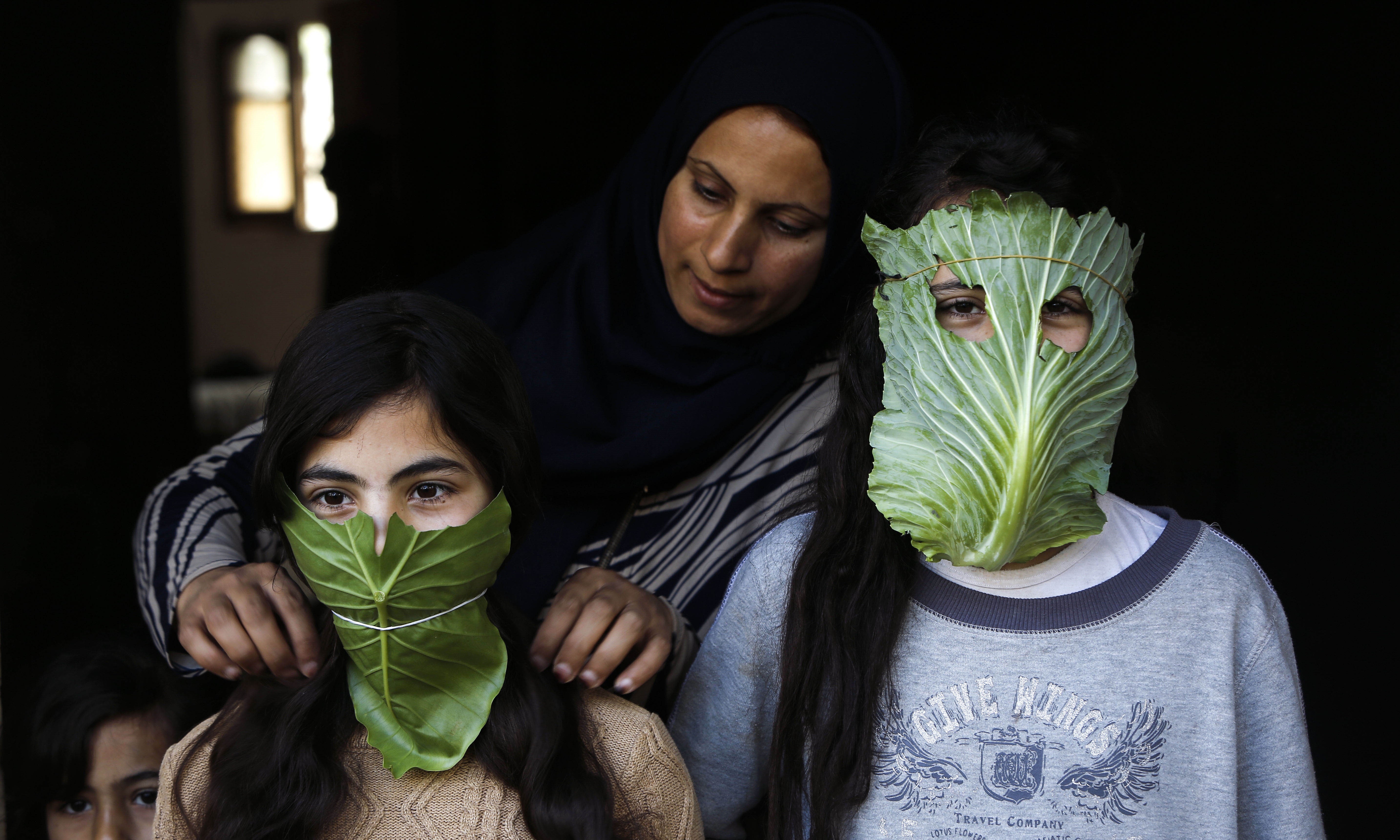 Jeux d'enfants dans la cuisine d'une famille palestinienne de la bande de Gaza (Mohammed Abed, AFP)