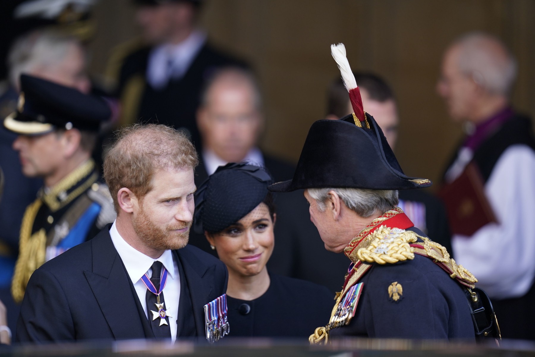 Le prince britannique Harry et Meghan quittent après avoir rendu hommage à Westminster Hall, au Palais de Westminster, à Londres, le 14 septembre 2022 (Photo, AFP).