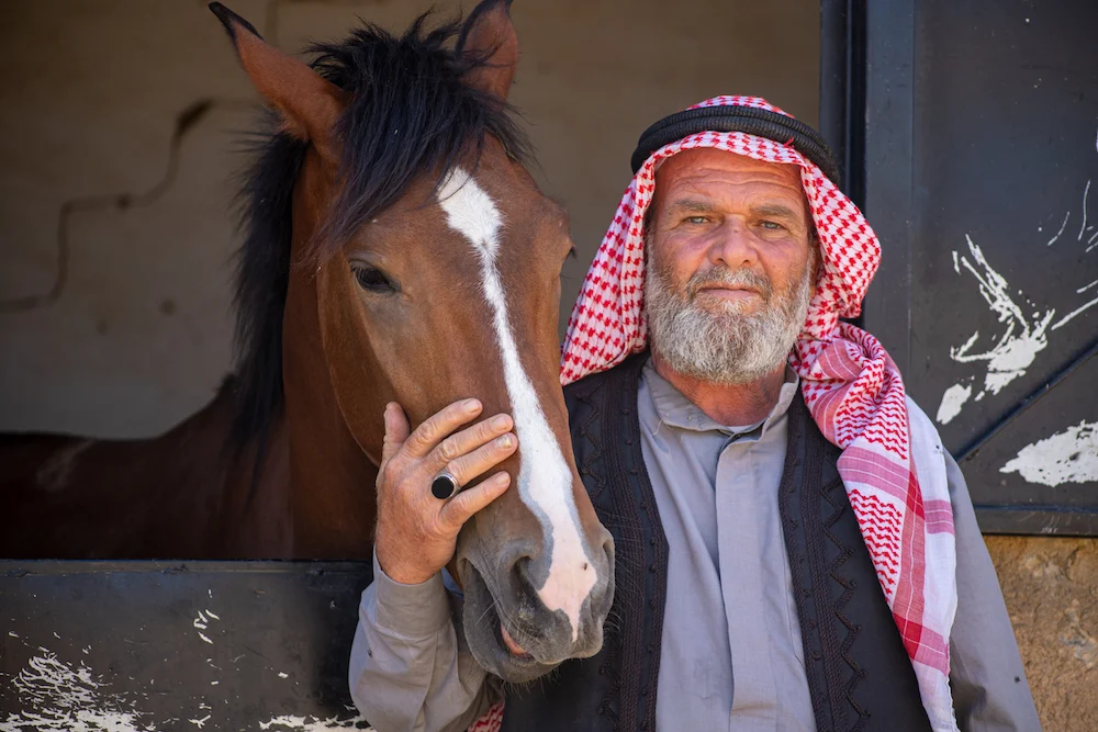 Passionate horse and equestrian owner Amer Madad is standing here with one of his Arabian horses.  (Photo / Ali Ali)