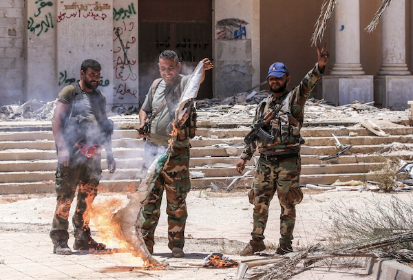 Le Centre syrien pour la justice et la responsabilité enquête et recueille des preuves de crimes de guerre. (AFP)