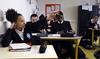 Plusieurs villes se préparent à tester l'uniforme à l'école