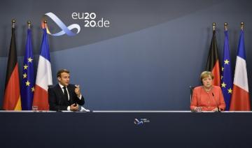 Macron et Merkel saluent côte à côte une journée "historique" pour l'UE