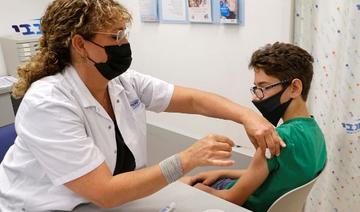 Michael, 12 ans, reçoit une dose du vaccin Pfizer/BioNTech aux services de santé Maccabi de la ville côtière de Tel Aviv le 6 juin 2021 (Photo, AFP)