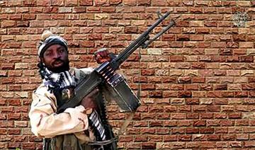 Une capture vidéo réalisée le 15 janvier 2018 montre le chef de faction de Boko Haram, Abubakar Shekau, tenant une mitrailleuse lourde (Photo, AFP) 