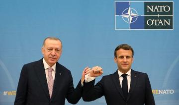 Dans cette photo publiée par le bureau de presse du président turc, le président Recep Tayyip Erdogan rencontre Emmanuel Macron lors d'une réunion bilatérale, en marge du sommet de l'OTAN, à Bruxelles, le 14 juin 2021. (Service de presse présidentiel Turc/AFP)
