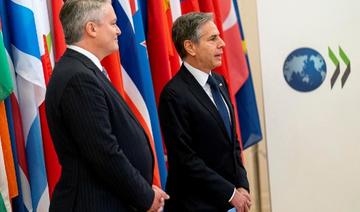 Le secrétaire d'État américain Antony Blinken et le secrétaire général de l'Organisation de coopération et de développement économiques (OCDE) Mathias Cormann lors de son arrivée au siège de l'OCDE à Paris, le 25 juin 2021 (Photo, AFP)
