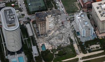 Les services de secours craignent pour la vie de 51 personnes «censées habiter» dans la partie effondrée de l'immeuble et n'ayant  ni appelé (pour signaler être en sécurité) ni demandé à quelqu'un d'appeler à leur place, a indiqué sur CNN Sally Heyman (Photo, AFP)