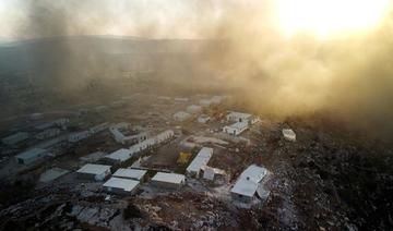 Une vue aérienne de Givat Eviatar, un nouvel avant-poste israélien, alors que la fumée des incendies dans le village palestinien de Beita, s’élève dans le ciel, en Cisjordanie occupée par Israël (Fichier/REUTERS) 