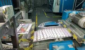 Le journal critique de Pékin Apple Daily imprime son dernier numéro (Photo, AFP)