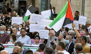 14 membres des forces palestiniennes accusés de la mort d'un critique d'Abbas
