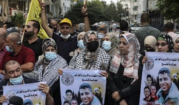Des partisans du mouvement Fatah manifestent pour soutenir les six prisonniers palestiniens, qui se sont évadés de la prison israélienne de Gilboa, devant le siège de la Croix-Rouge à Gaza le 11 septembre 2021 (Photo, AFP)