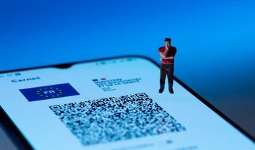 Un téléphone portable dont l'écran porte le certificat numérique Covid de l'UE, le 20 juillet 2021 à Paris (Photo, AFP) 