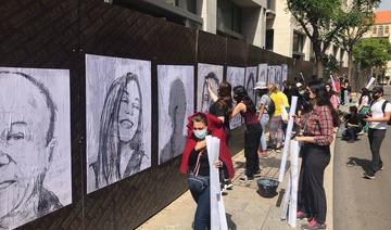 Un mur commémorant l’explosion de Beyrouth recouvert de portraits des victimes