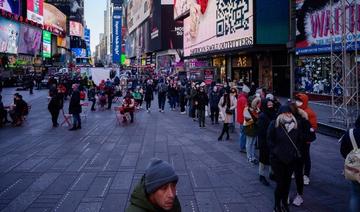 Avec Omicron, moins de monde et des masques pour les fêtes à Times Square