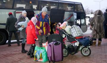 Ukrainiens en Pologne: entre l'angoisse et la volonté de se battre