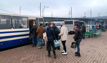 En photos: Les habitants de Kiev se mettent à l'abri après l'annonce de l'offensive russe