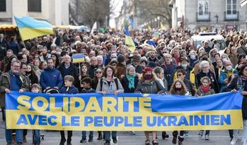 Ukraine: pour arriver en France, tapis rouge et zones d'ombre