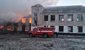 En photos: Les Ukrainiens enterrent leurs morts sous les bombes