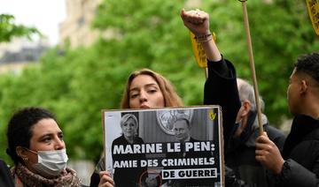 L'évacuation musclée d'une militante vire au pugilat entre Le Pen et Darmanin