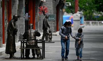 Covid: nouvelles restrictions à Pékin, aux airs de ville fantôme