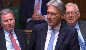 Brexit: Hammond lie un accord au sort des services financiers