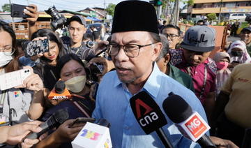 Législatives en Malaisie: La coalition d'opposition d'Anwar Ibrahim revendique de former le gouvernement