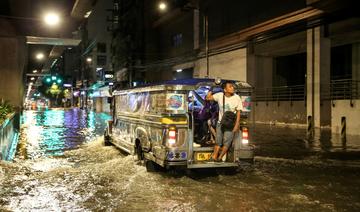 Philippines: des centaines de personnes fuient des inondations au passage d'un typhon