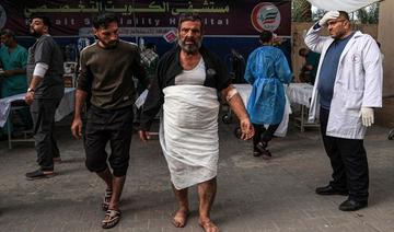 La guerre a fait 20 000 morts à Gaza selon le Hamas, tractations en vue d'une trêve