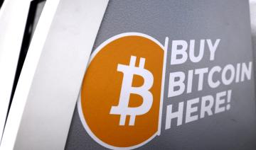 Le bitcoin dépasse 60000 dollars, s'approchant de son record historique