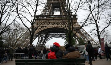 Les touristes de retour à Paris pour les fêtes de fin d’année