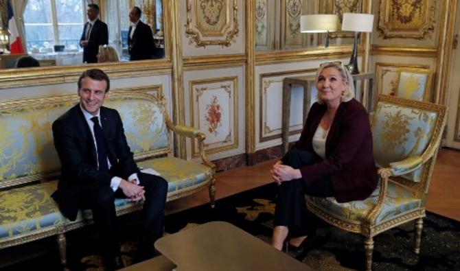 Le président français Emmanuel Macron assiste à une réunion avec la chef du parti d'extrême droite français Rassemblement national (RN) Marine Le Pen à l'Elysée à Paris, France, le 6 février 2019 (Photo, AFP)