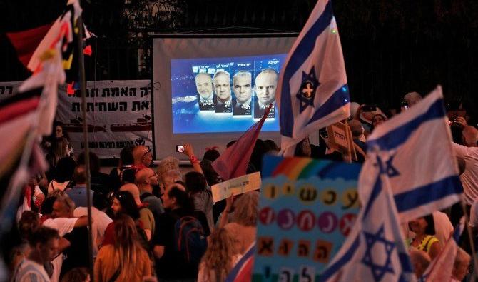 Des Israéliens ont célébré dans les rues de Tel-Aviv et Jérusalem, théâtres de manifestations anti-Netanyahu pendant un an (Photo, AFP) 