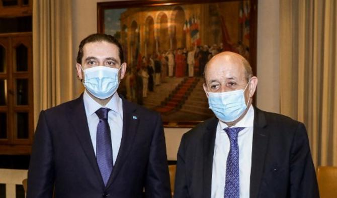 Photo prise le 6 mai 2021 lors d’une rencontre entre le Premier ministre libanais désigné Saad Hariri (g) et le ministre français des Affaires étrangères et européennes Jean-Yves Le Drian (d) à Beyrouth. (AFP / Dalati et Nohra)
