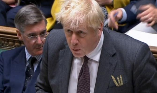 Une capture vidéo d'images diffusées par l'Unité d'enregistrement parlementaire (PRU) montre le Premier ministre britannique Boris Johnson s'exprimant à la Chambre des communes à Londres le 15 septembre 2021 (Photo, AFP)
