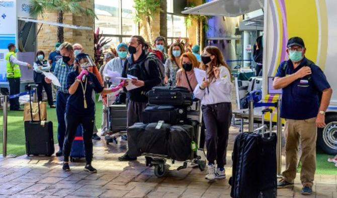 Quelques centaines de voyageurs étrangers ont atterri lundi en Thaïlande qui rouvre ses portes aux visiteurs internationaux après 18 mois de verrouillage. (Photo, AFP)