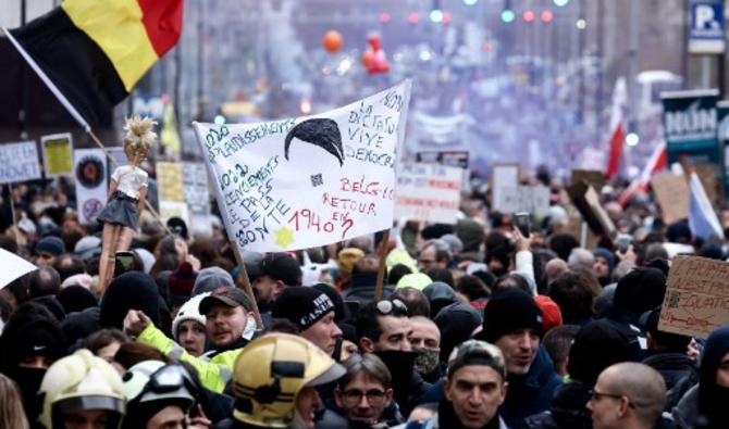 Des manifestants participent à un rassemblement pour protester contre les mesures du gouvernement belge pour freiner la propagation de Covid-19 et la vaccination obligatoire à Bruxelles, le 5 décembre 2021. (Photo, AFP)