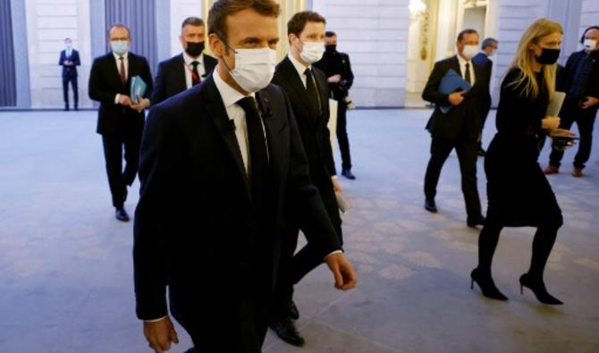 Le président français Emmanuel Macron arrive pour une conférence de presse, à Paris, le 9 décembre 2021. (Photo, AFP)