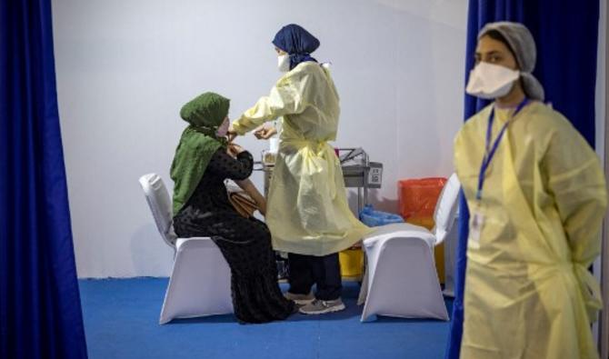 Salle de vaccination dans le Vaccinodrome numérique, près de Casablanca. (Photo, AFP)
