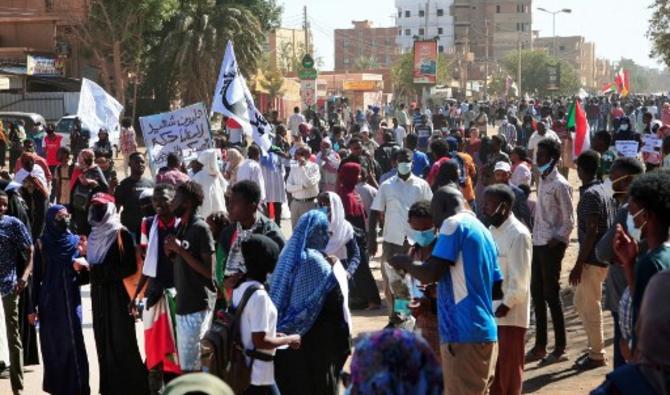 Une manifestation appelant à un régime civil et dénonçant l'administration militaire, à Umdurman, le 14 février 2022. (Photo, AFP)
