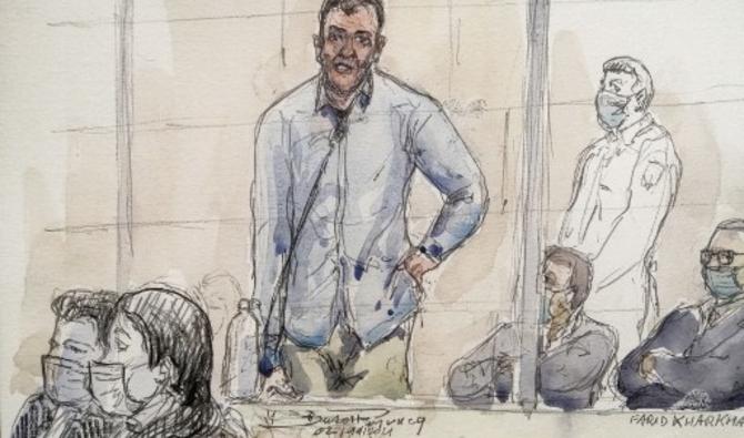 «D'abord bonjour», lance à la cour l'accusé belge de 35 ans, Yassine Atar, cheveux bruns coupés courts, chemise en jean grise. (Photo, AFP)