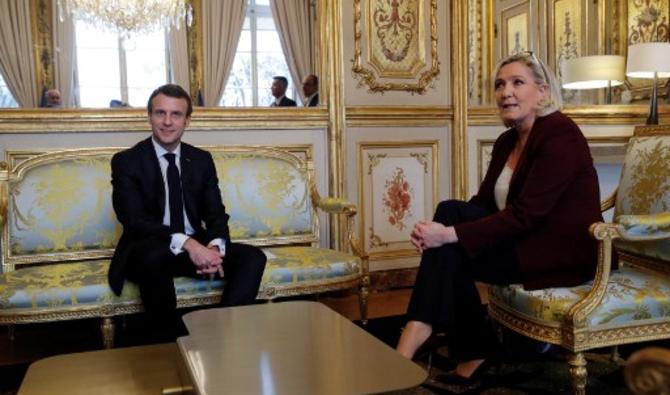 Le président français Emmanuel Macron assiste à une réunion avec la chef du parti français d'extrême droite Rassemblement national (RN) Marine Le Pen à l'Elysée à Paris, France, le 6 février 2019. (Photo, AFP)