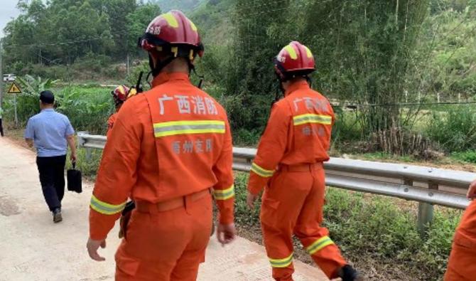 Des sauveteurs se rendent sur le site de  l'accident d'un Boeing-737 qui s'est écrasé dans la ville de Wuzhou, dans la région méridionale du Guangxi en Chine, le 22 mars 2022. (Photo, AFP)