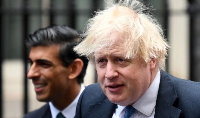 Le Premier ministre britannique Boris Johnson et Le ministre des Finances, Rishi Sunak, à Downing Street, dans le centre de Londres, le 1 décembre 2021. (Photo, AFP)