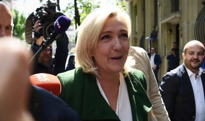 Marine Le Pen, candidate à la présidentielle du parti d'extrême droite Rassemblement national (RN), arrive au siège du RN à Paris, le 25 avril 2022. (Photo, AFP)
