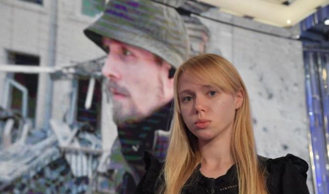 «Nous demandons des actes décisifs du gouvernement, nous voulons qu'ils survivent tous pour raconter leur histoire à leurs enfants et petits enfants. (...) Nous ne devons pas rester là à pleurer, nous devons tout faire pour les sauver», a dit Kateryna Prokopenko, épouse d'un des chefs de la division Azov, Denis Prokopenko. (Photo, AFP)