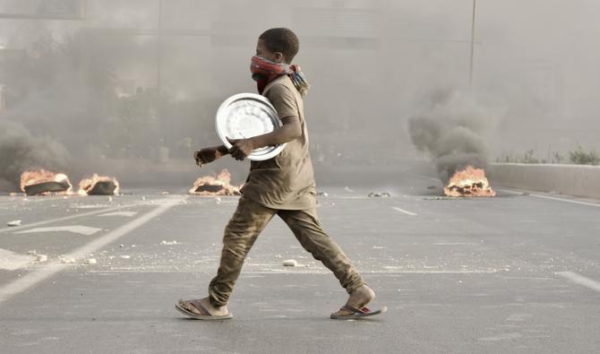 Une manifestation contre l'arrestation de Barthelemy Diaz, Ousmane Sonko et Malick Gakou à Dakar, le 10 novembre 2021. (Photo, AFP)