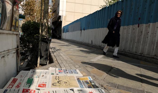 Selon les médias locaux, les services de sécurité ont publié vendredi un rapport faisant référence à la journaliste Elaheh Mohammadi du quotidien Sazandegi et à la photographe Niloufar Hamedi du journal Shargh, qui avaient contribué à rendre publique l'affaire de Mahsa Amini et sont détenues depuis des semaines. (Photo, AFP)