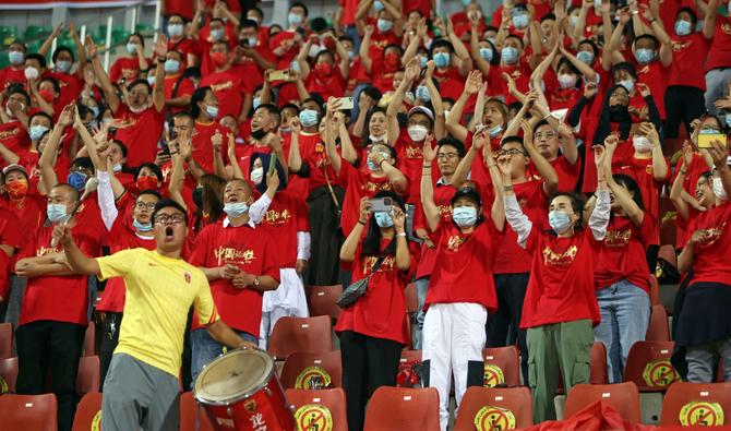 La télévision chinoise, en retransmettant les matchs de la Coupe du monde de football, ne montre plus d'images de spectateurs sans masques. (Photo, AFP)